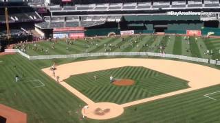 Fans Get In A Post-Game Fathers Day Catch In The Coliseum Outfield.