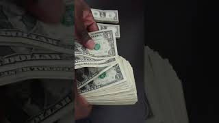 counting $200 dollars in $1 dollar bills USD cash