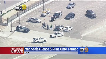 Man Arrested After Jumping Fence At LAX, Reportedly Doing Push-Ups On Tarmac