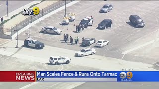 Man Arrested After Jumping Fence At LAX, Reportedly Doing Push-Ups On Tarmac