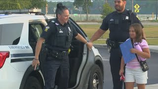 Toledo police escort daughter of fallen officer to her first day of school