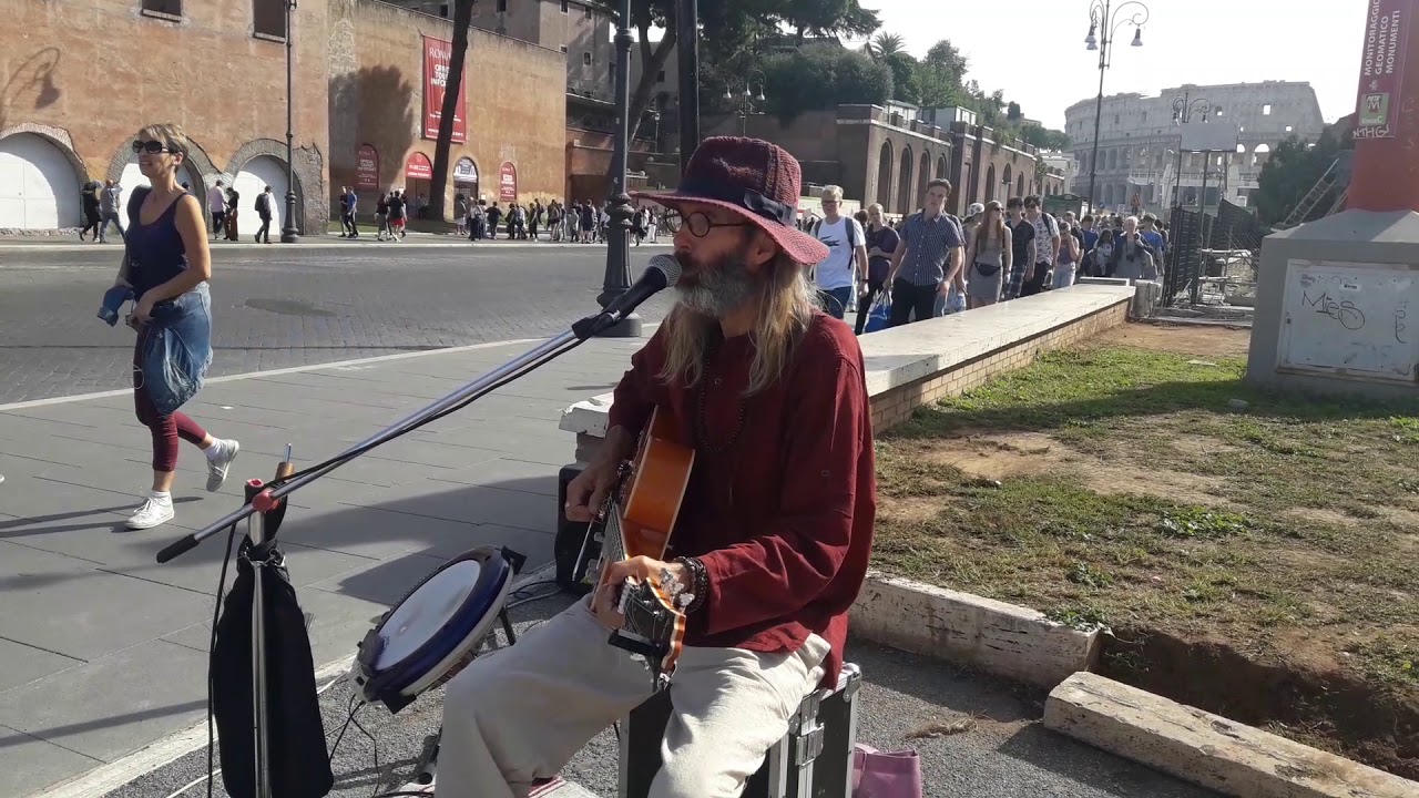 Busking at the Colosseum, Rome - blues on the street (CC Rider) - YouTube