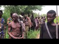 Nigerian Hunters Cleaning And Sharing Bushmeat After Hunting