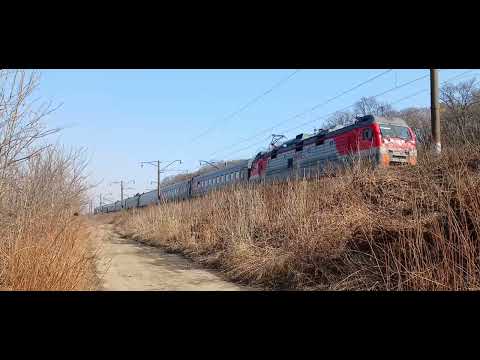 Электровоз ЭП1П-008 со скорым поездом №028Ь Благовещенск-Владивосток следует по утренниму Транссибу.