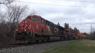 Short Freight Train CN 594 West w/Containers Rolling pass Boundary Creek, NB
Canadian National Railway locomotives 3170 (Tier 4 ET44AC Gevo), and 2855 (ES44AC Gevo) power a short manifest train CN L594 West (Moncton, NB Gordon Yard to Saint John, NB NBSR Island Yard) westbound rolling pass Boundary Creek, NB on an overcast afternoon hauling 40 cars of freight including 15 platforms of intermodal containers, a couple boxcars, and some LPG tankers.
Filmed at 1:47pm, Saturday April 25, 2026 at about mile 8.3 of the CN Sussex Subdivision.
Camera: Sony HDR-PJ440 Short Freight Train CN 594 West w/Containers Rolling pass Boundary Creek, NB