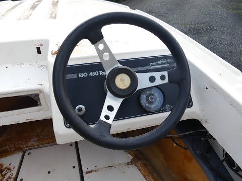 Vidéo: Comment retirer un câble de direction d'un volant de bateau ?