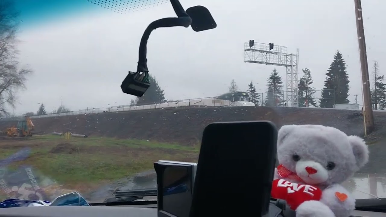 Amtrak Cascades talgo train 🚆 going across Mill Street grade crossing in Kelso, Washington Usa