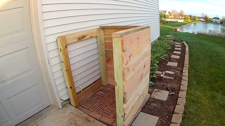 Stop your trash can from blowing over!! DIY Cedar garbage fence storage