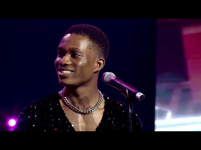 SHY Mesmerizes Judges with Lady in Red on The Voice Nigeria Season 4 Live Shows class=