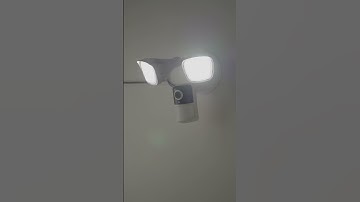 Intelligent ieGeek floodlight cam alerts with siren and lights for ultimate security.