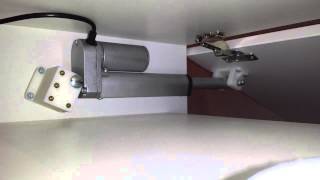 Linear actuator door opener