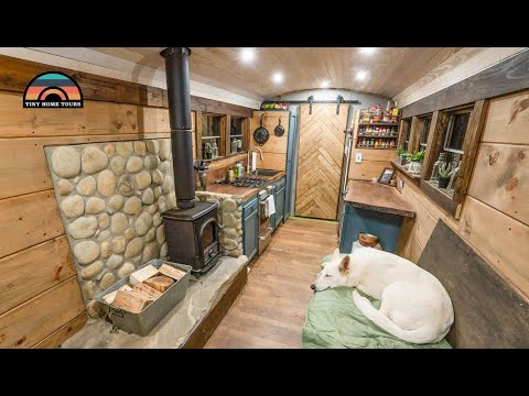 Couples DIY Off Grid Raised Roof School Bus Conversion Tiny House