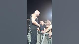 Disturbed stops show to comfort scared girl