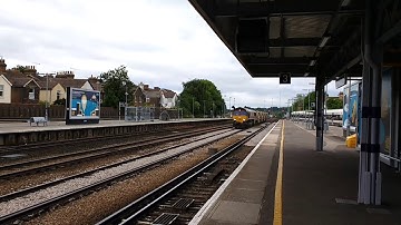 EWS Class 66182 at Tonbridge Railway Station with Autoballasters