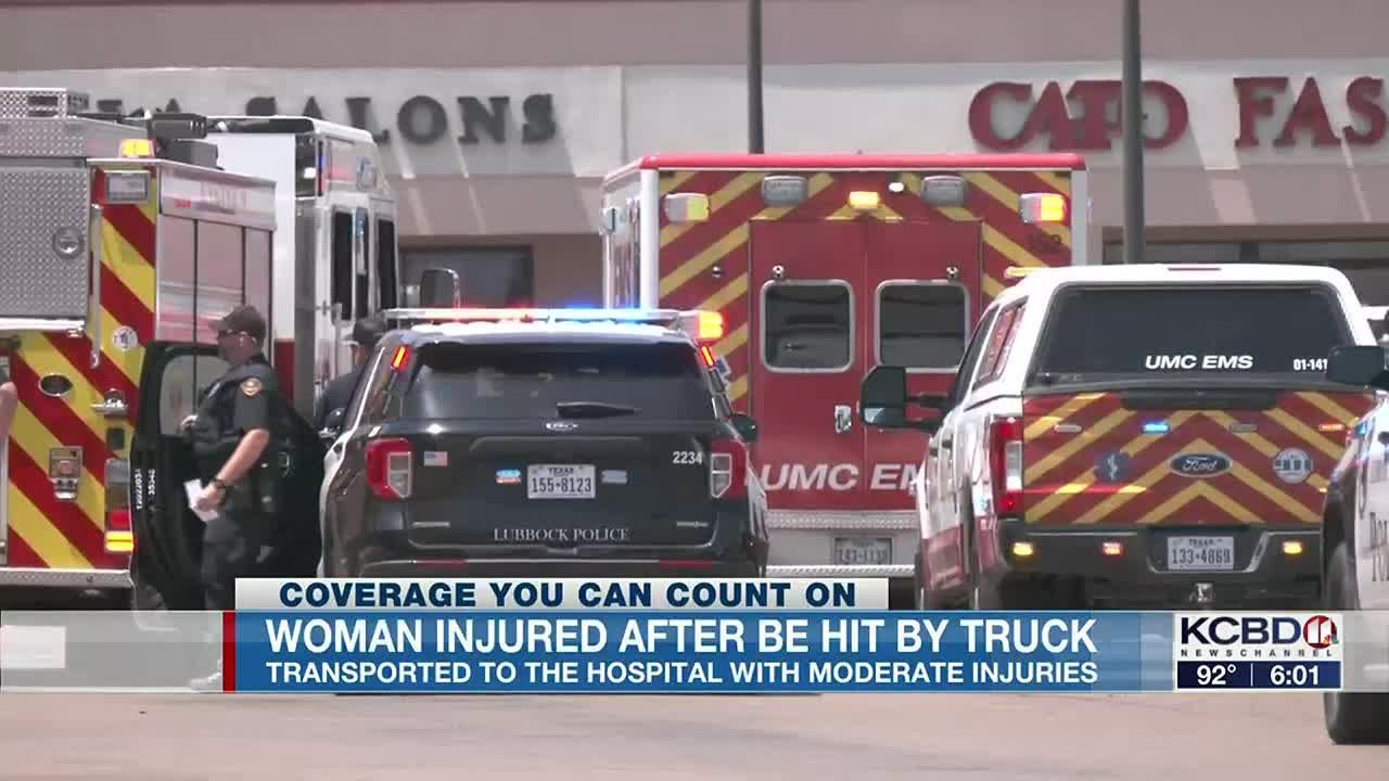 Woman injured after being hit by truck - YouTube