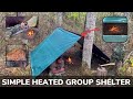 Solo overnight building a simple heated group shelter in the woods and campfire ribeye steak