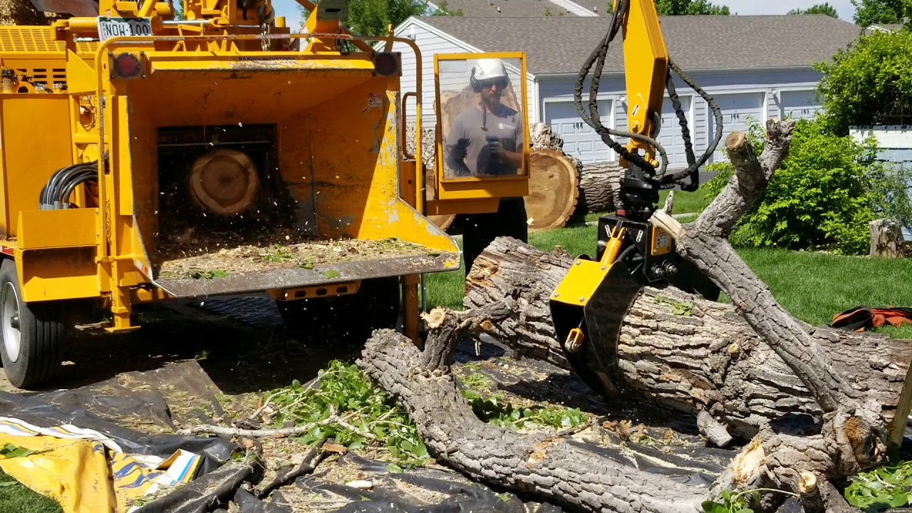 Grapple mounted on huge chipper YouTube
