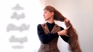 9 steps on how to make an easy 1890s Gibson Girl Hairstyle with very long hair