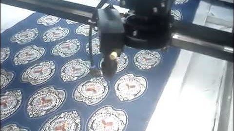 GN1080CCD camera oriented laser cutting machine   embroidery label cutting