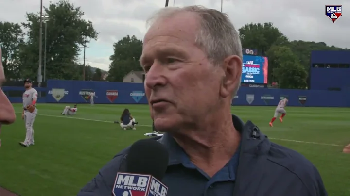 Former President George W. Bush talks with JP Morosi