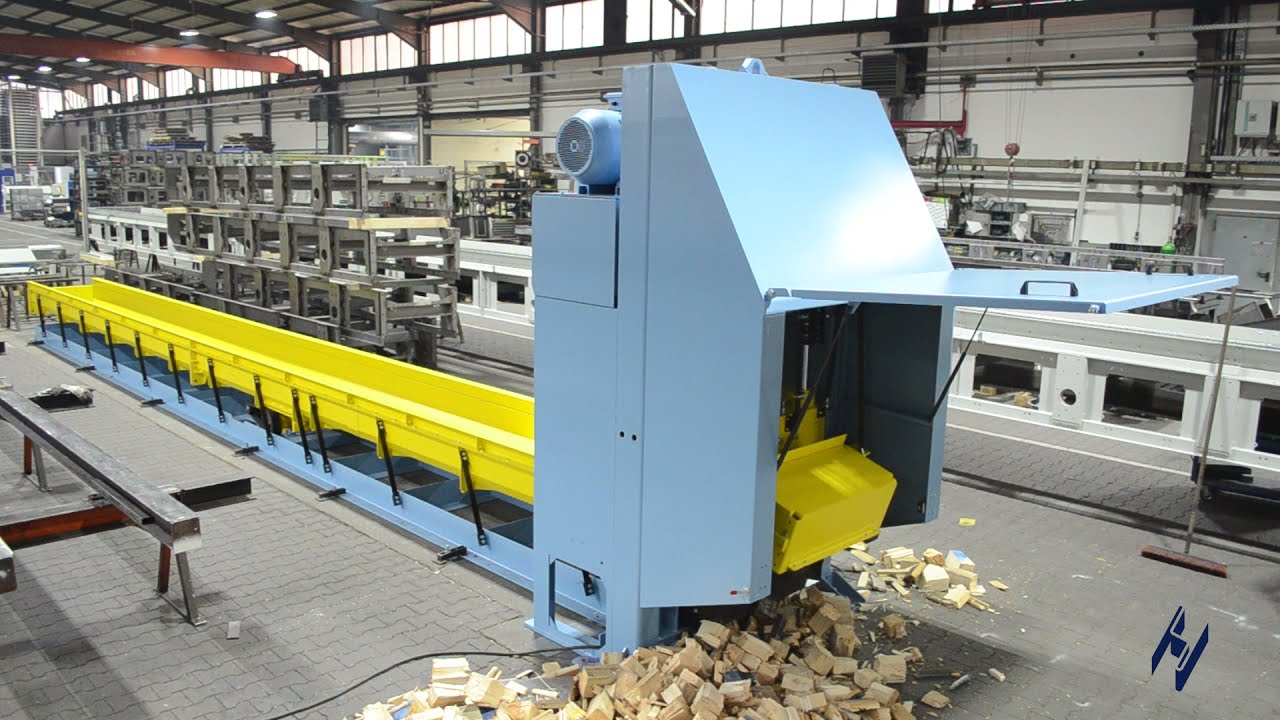 Huber Technik Scherautomat/ Kürzmaschine mit Vibrationsrinne und schneller Hydraulik