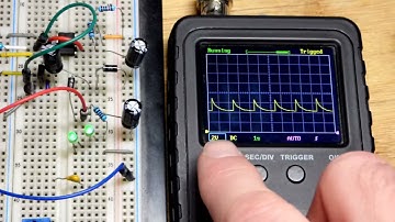 Voltage doubler w diode drops using 555 timer switched MOSFET push pull and capacitors schematic