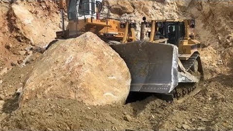 Caterpillar D8T Bulldozer Pushing Huge Rocks - Labrianidis Mining