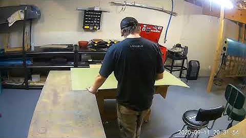 Dimpling the left wing top skins, close-up view. -- RV-7