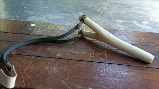 DIY Slingshot from old rubber tires and wooden branches