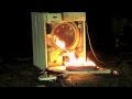 Washing machine explodes with petrol at 1200 spin