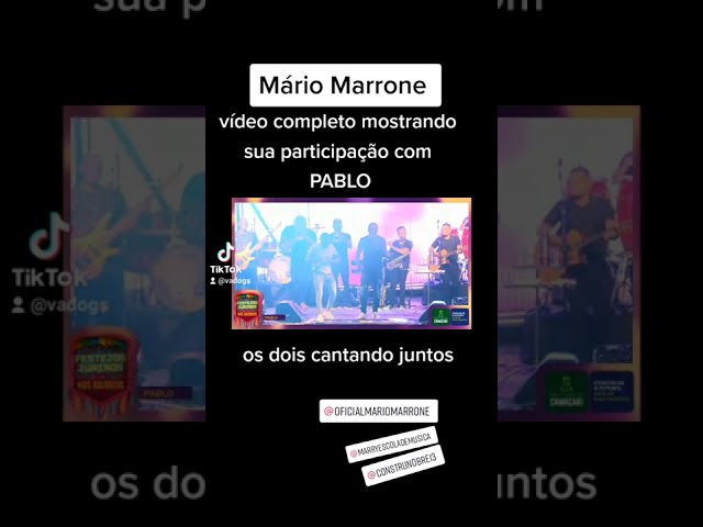 Mário Marrone cantando junto com Pablo class=