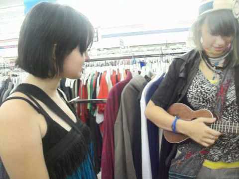 us singing the FUN Song in the thrift store