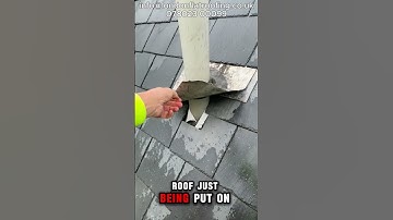 Badly installed pipe flashing detail on new slate roof.