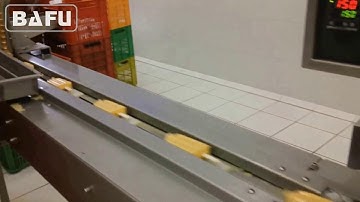 Inverted flow wrapper, Inverted Wrapper, top seal flow-pack machine, Horizontal Packaging Machine