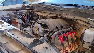Spark plugs, wires, and ignition coils on a 2014 Chevrolet Silverado 1500