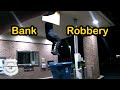 Bank Robbery Suspect Drops Out of Ceiling And Into Recycling Bin in Front of Officers