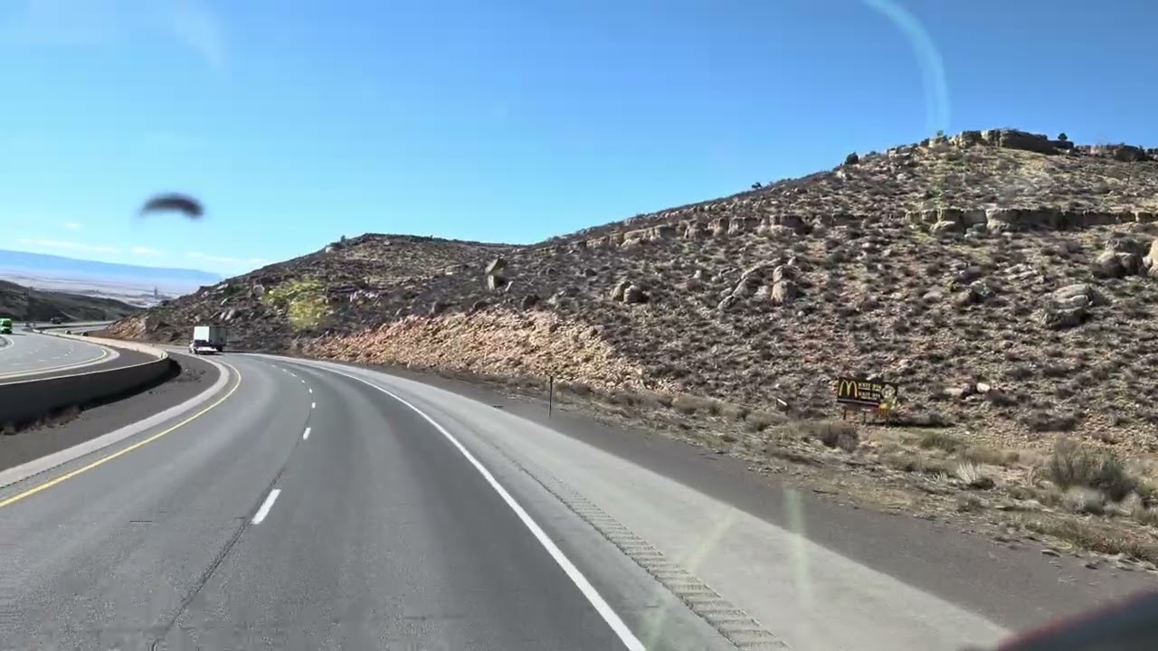 How to go down a long steep grade in heavy winds 55 to 60 mph