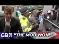 Protesters attack gb news staff and overpower police over migrant relocation  the mob won