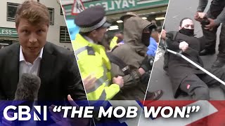 Protesters ATTACK GB News staff and overpower police over migrant relocation - ‘The mob WON!’