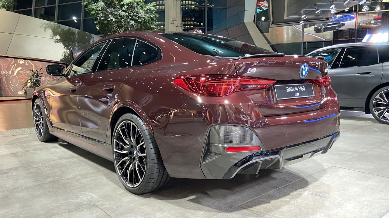 New BMW i4 M60 xDrive in Burgundy Red Pearl Effect metallic