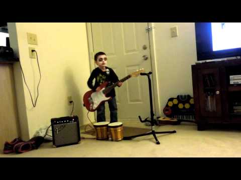 4-year-old-playing-electric-guitar