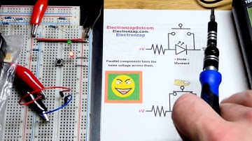 Voltages of push button switch based NOT gate circuit with LED load using oscilloscope