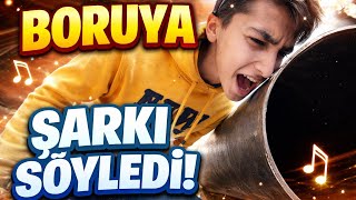 Boruya Şarkı Söyleyen Çocuk