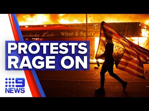 Minneapolis protests escalate after officer charged | Nine News Australia