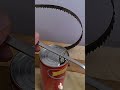 Standard operation for safely opening metal can lids to prevent cuts and splashes 📏