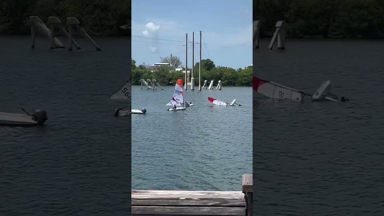 Lisa laughing at 2 Sailing dinghies flipping, while she does laundry #shorts  #laundryday  #sailing