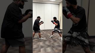 Antonio Russell getting locked and loaded backstage in Vegas.
