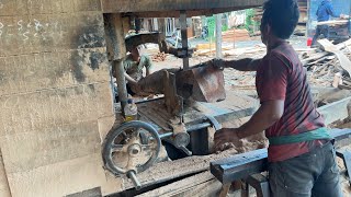 The process of sawing hardwood with great care