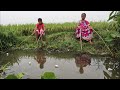 Fishing   traditional lady amazing catching hook fishing in village canal mud water