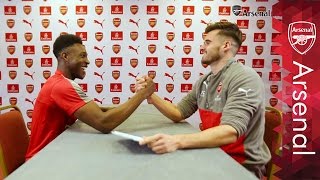 Danny Welbeck arm wrestles Carl Jenkinson